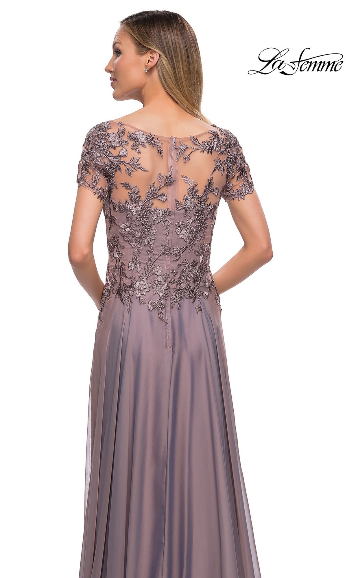 Back view of the Long Formal Dress: La Femme 29235, a dark mauve gown with a floor-length chiffon skirt and a sheer bodice featuring dark floral embroidery and short sleeves.